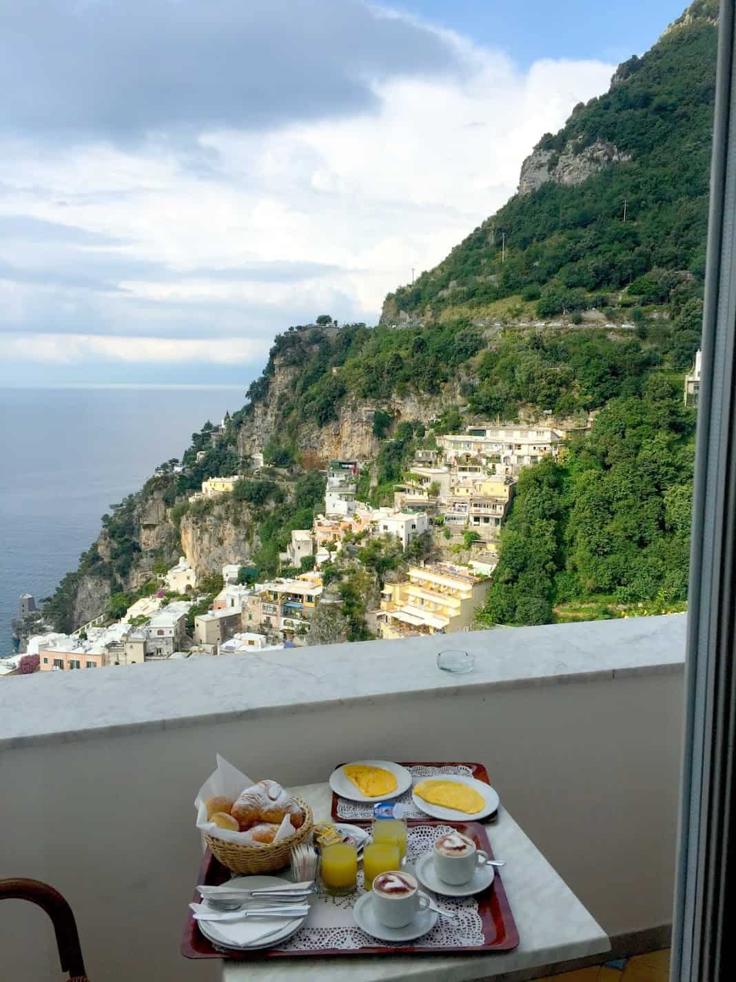 breakfast in Positano Italy with a view of the mountains and sea