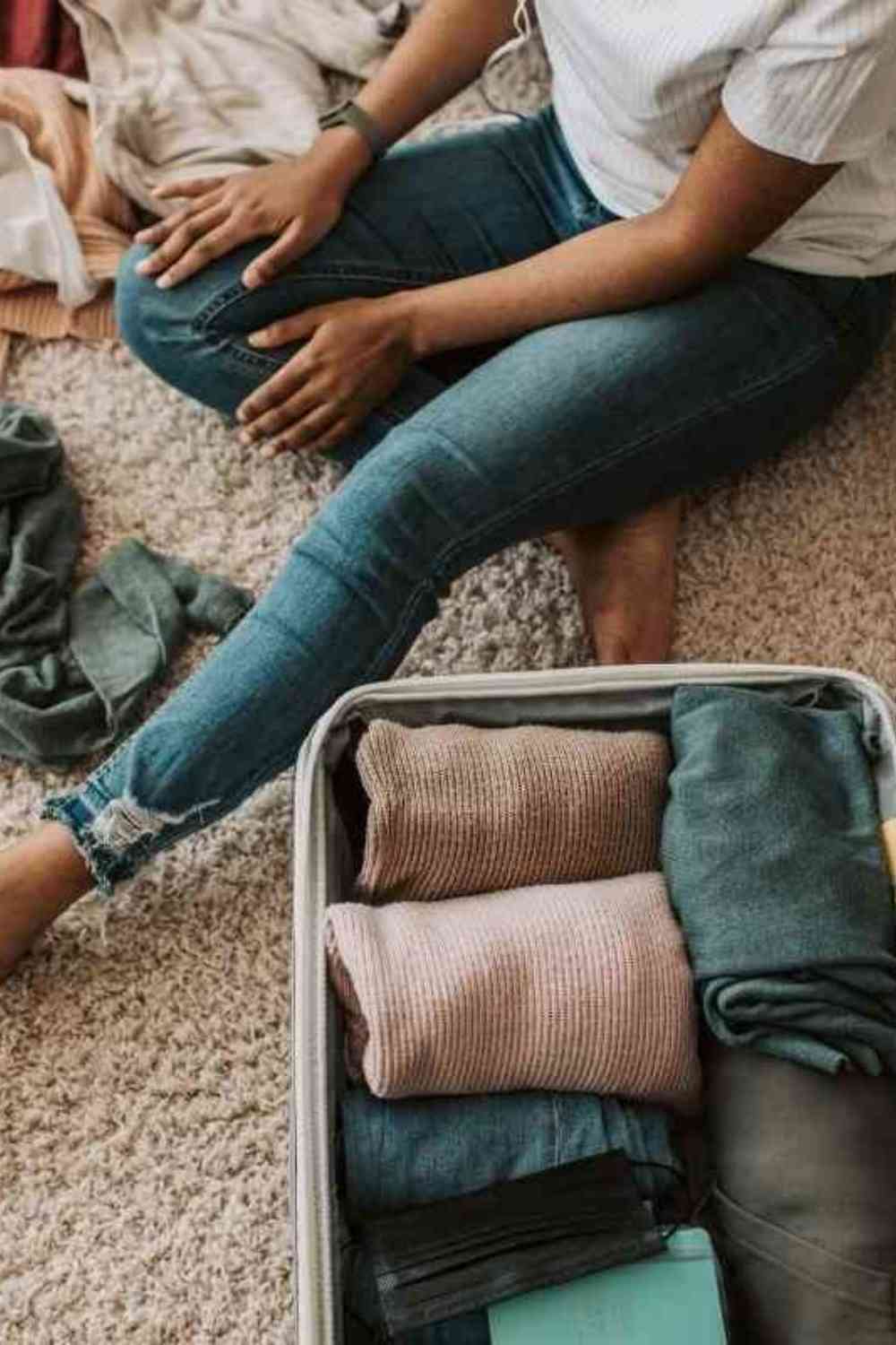 girl packing her suitcase for a trip