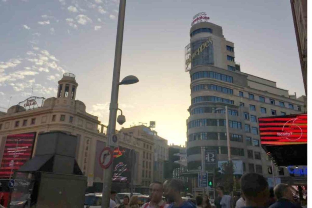 Madrid Gran Via at sunset Schweppe's building 