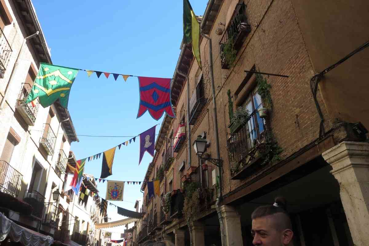 alcala de henares, madrid, spain, medieval festival flags
