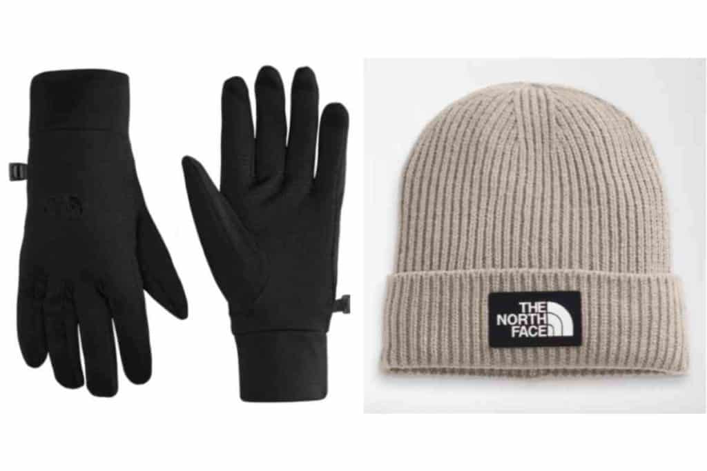 Tan winter hat and black pair of winter gloves
