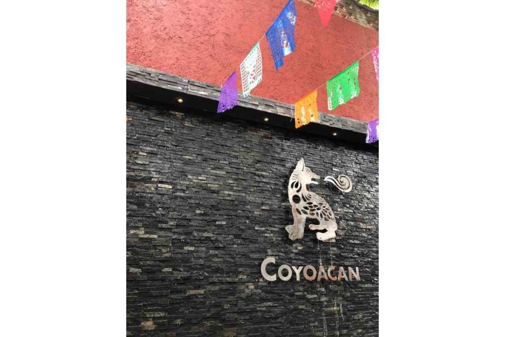 Coyoacan sign with a coyote at the Mercado de Artesanias in Coyoacan Mexico City