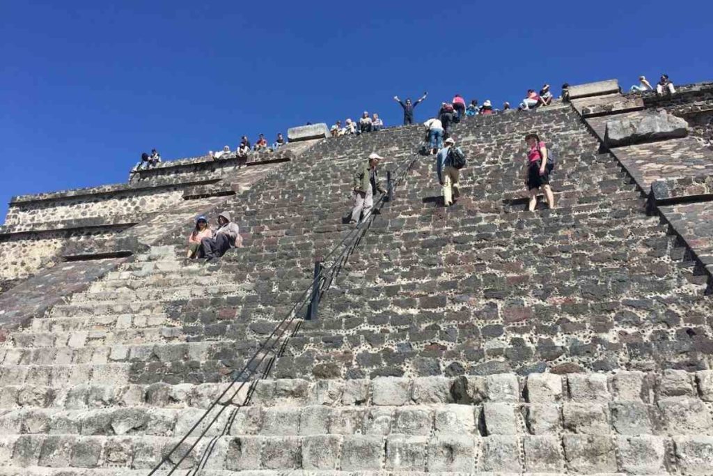 Climbing up the pyramids of Teotihuacan in mexico city