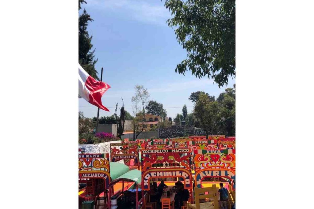 colorful trajineras in xochimilco mexico city