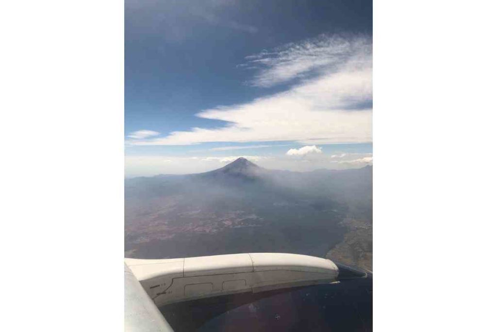 flying by a mountain or volcano in Mexico