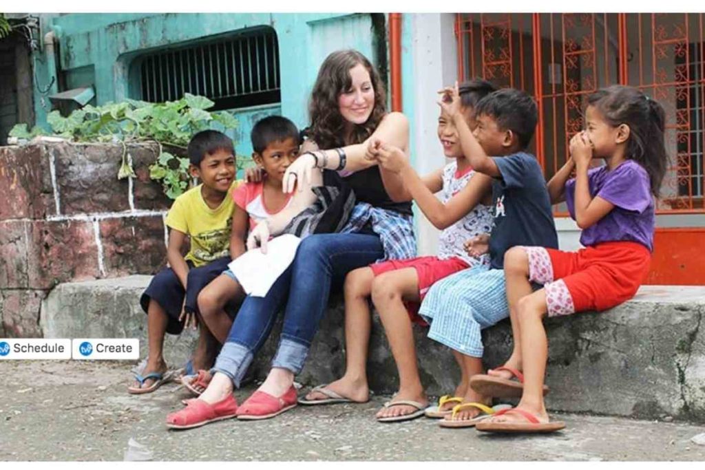 girl traveling to volunteer with children 