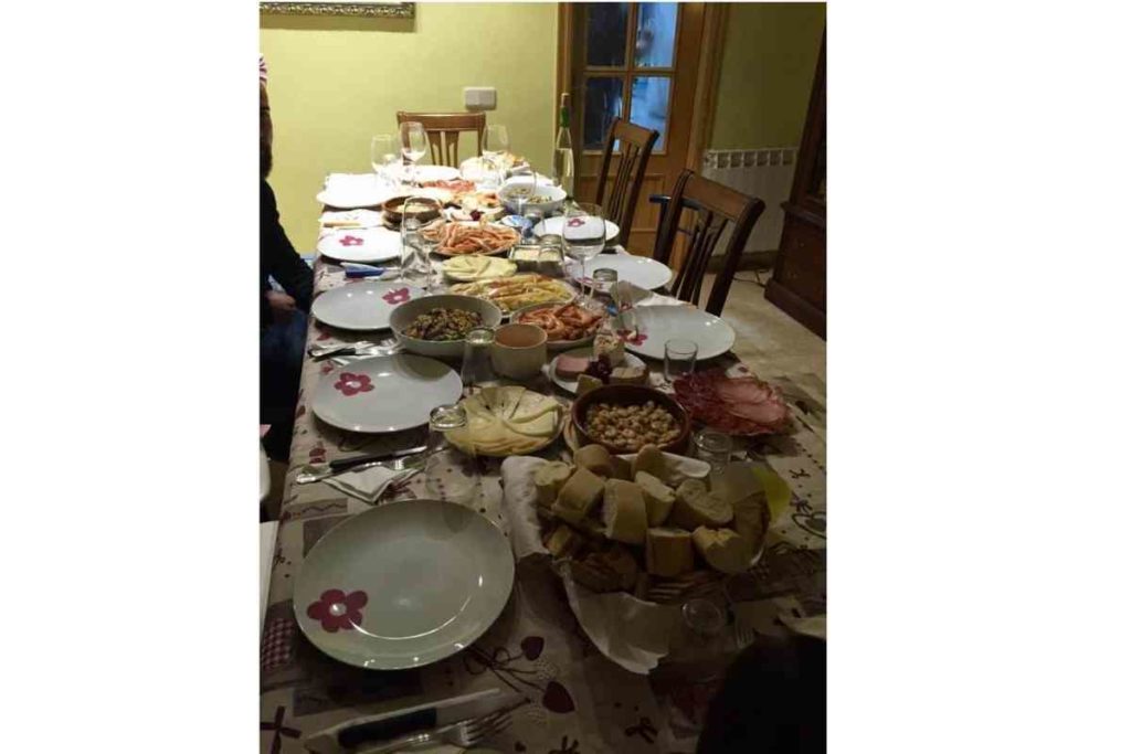 table spread with food on christmas eve in madrid, spain