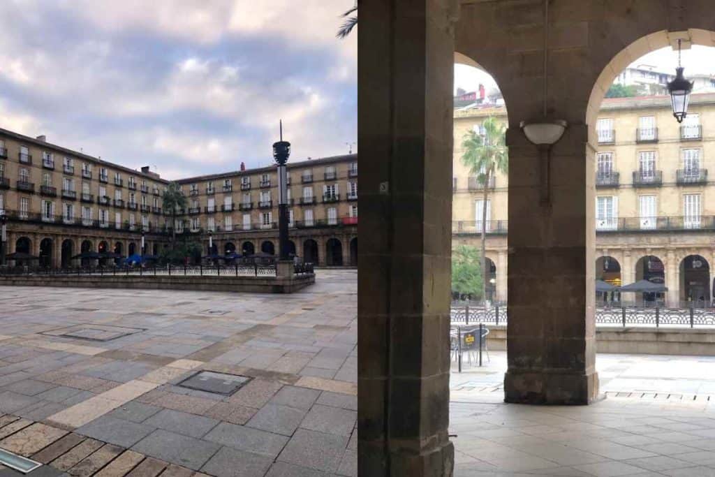the restaurant filled Plaza Nueva/ New Square in Bilbao on a partly sunny day 