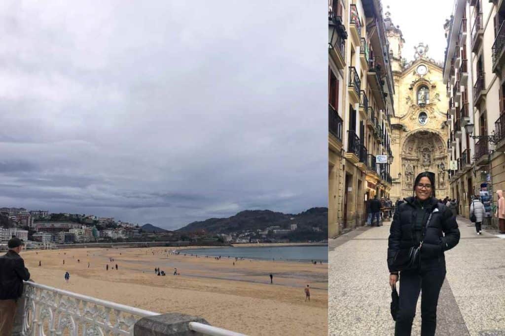 La Concha beach in San Sebastian on a cloudy day and people sitting on the beach, a girl standing in front of the The Basilica of Santa Maria in San Sebastian, Spain