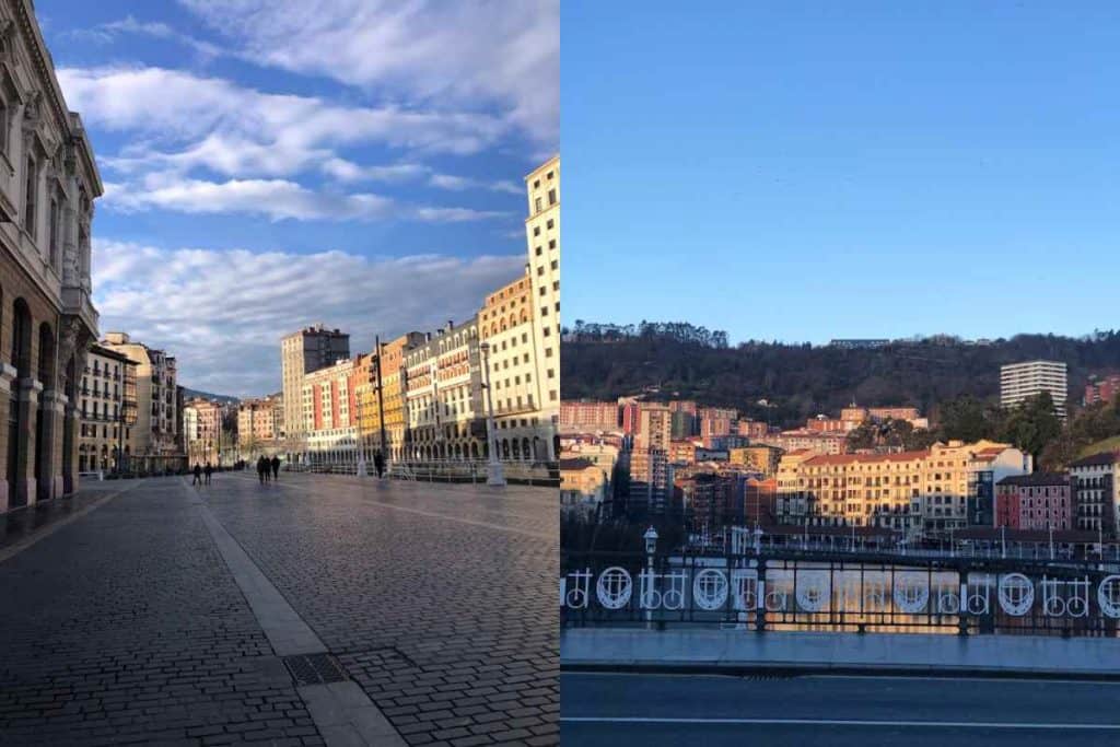 Bilbao, Spain in the morning as the sun comes up and shines on the historic buildings by the Nervion River