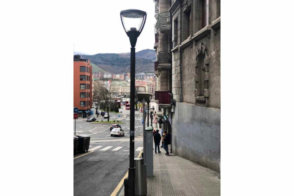 People walking around the streets of the Uribarri neighborhood in Bilbao, Spain