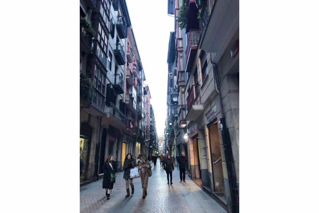 People walking the streets of the historic center or Casco Viejo in Bilbao, Spain 