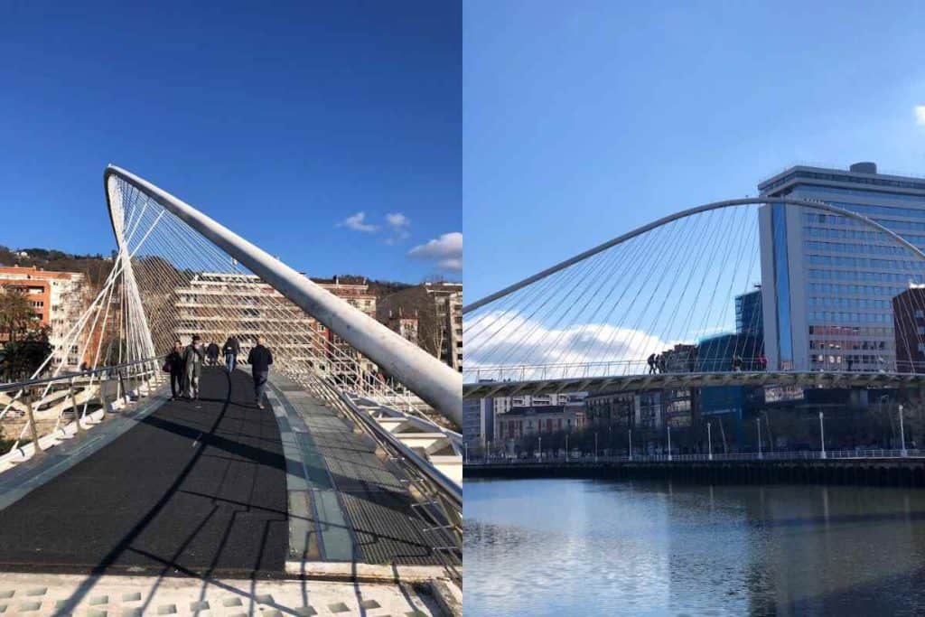 People walking across the Zubizuri Bridge in Bilbao on a sunny day