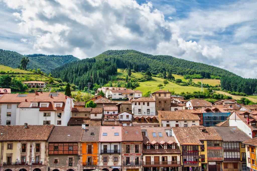 Charming red and brown Spanish roofs of towns in the Cantabria region of Spain.